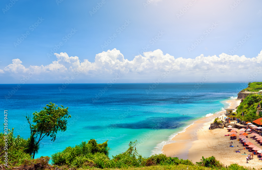 Bali seascape with turquoise ocean and white sand beach