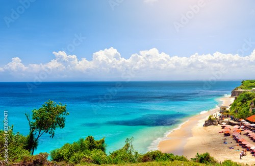 Bali seascape with turquoise ocean and white sand beach photo