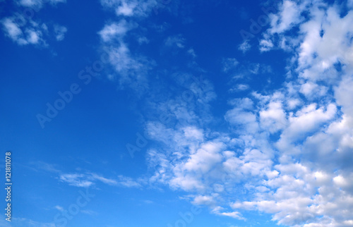 Blue sky background with clouds © sunlike