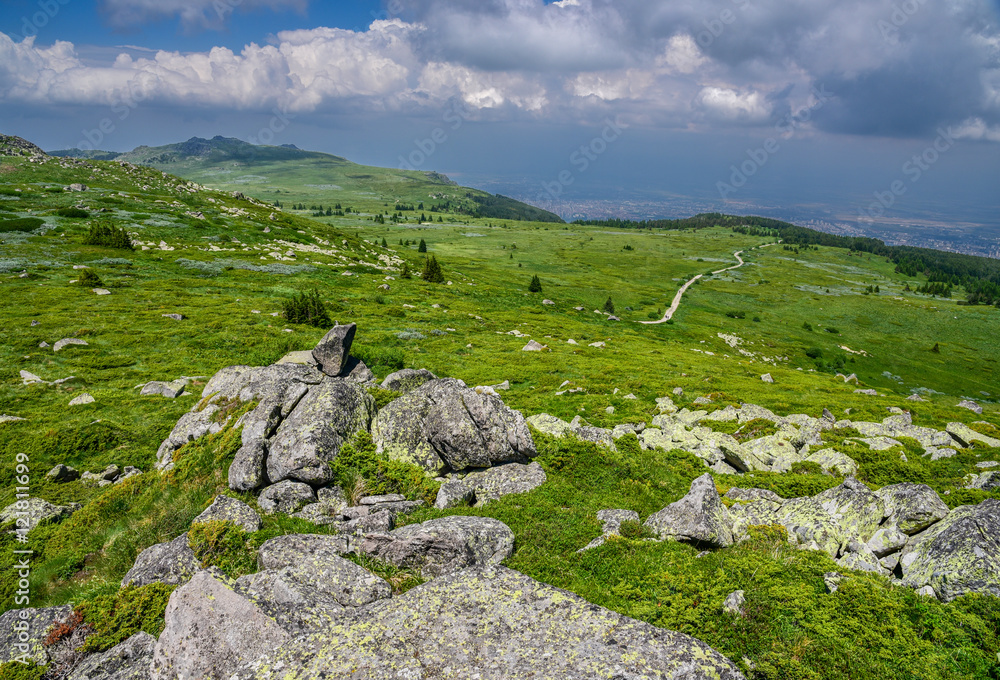 Path through the mountains at Vitosha, Sofia, Bulgaria - popular Bulgarian tourist destination with blue skies and amazing scenery
