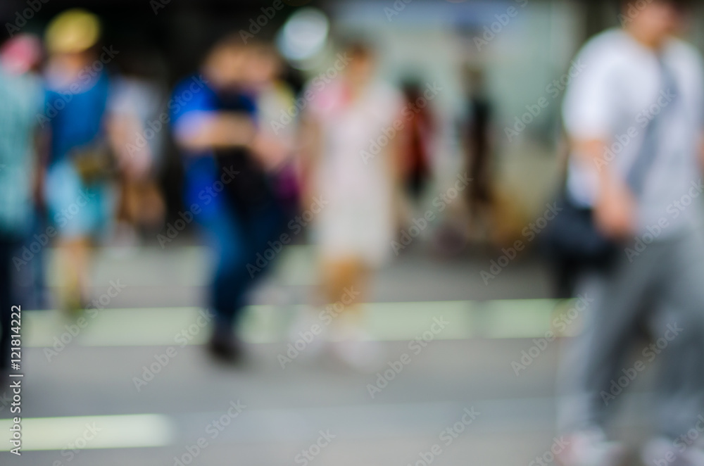 people in motion blur at the skytrain station people in motion blur at the skytrain station