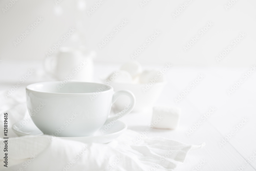 White crockery on a white table White crockery on a white table