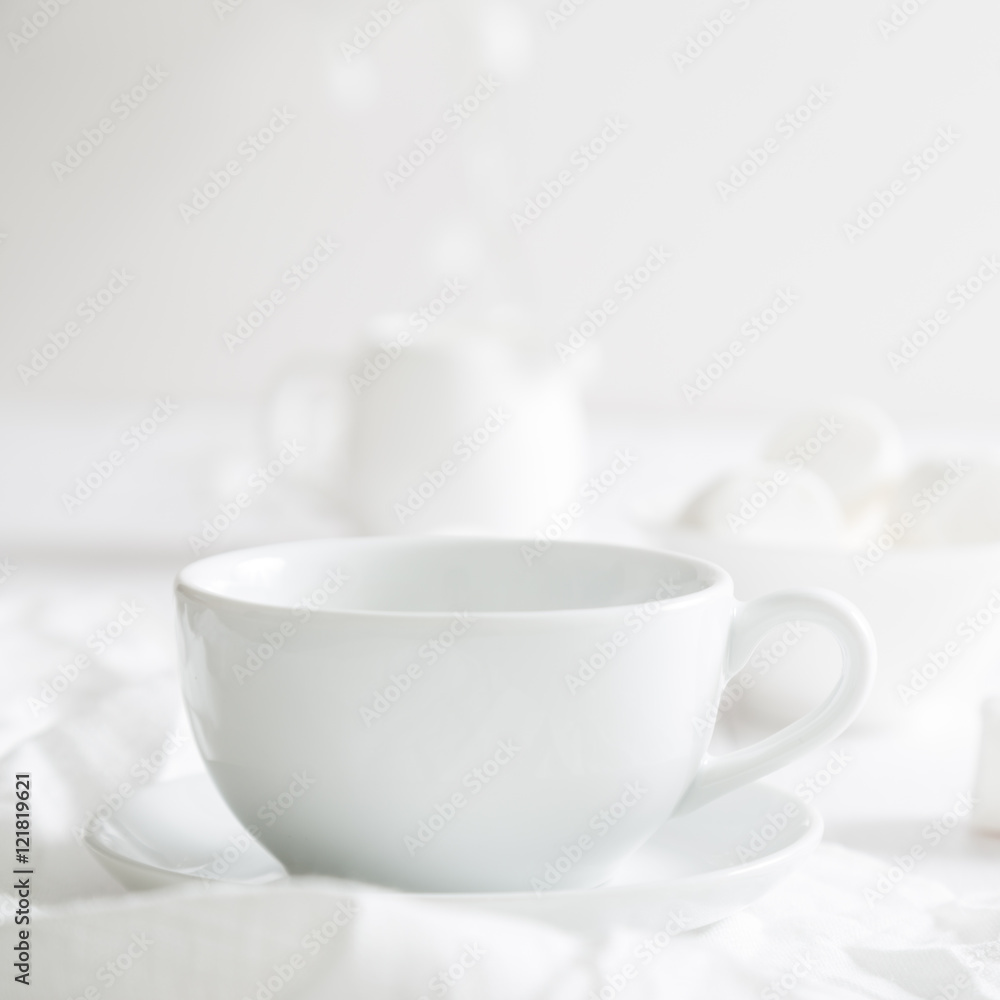 White crockery on a white table White crockery on a white table