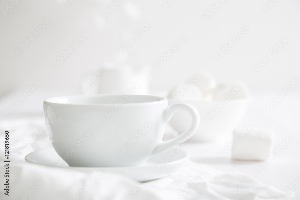 White crockery on a white table White crockery on a white table