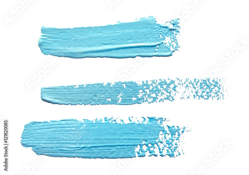  Three turquoise  light blue  strokes of the paint brush isolate