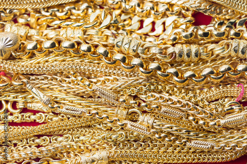 closeup gold necklaces