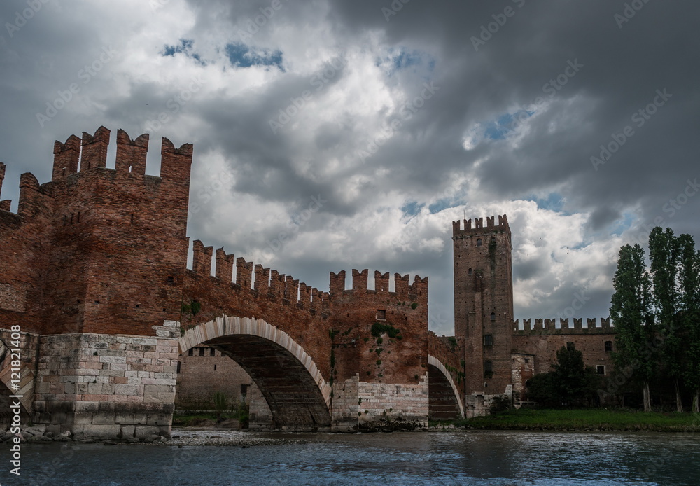 Beautiful photo of medieval stone bridge Ponte Scaligero built in 14th century near Castelvecchio. Verona, Italy.