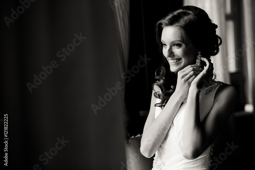 Black and white photo of the smile of the bride