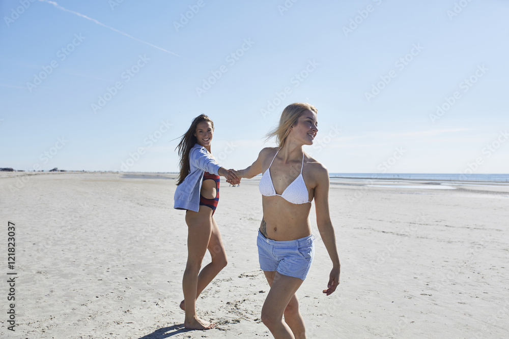 Two female friends on the beach Two female friends on the beach