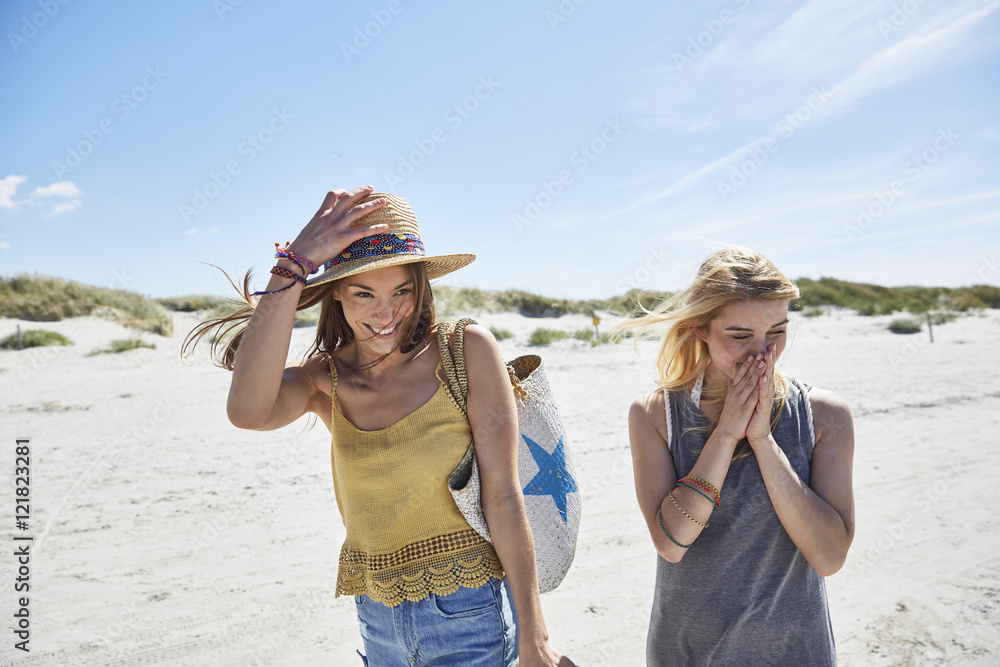 Two happy female friends on the beach Two happy female friends on the beach