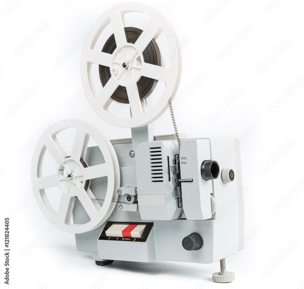 Old film projector isolated on a white background Old film projector isolated on a white background