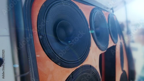 Closeup at moving sub-woofer. Speaker part.