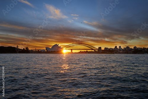 Opera house and Harbour bridge with twilight sunset at dusk.