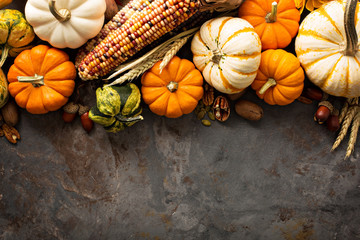 Fall background with pumpkins