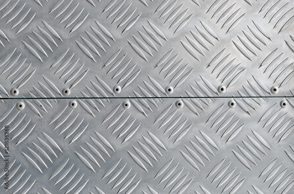 metal texture, shiny aluminum background with diagonal relief part metal texture, shiny aluminum background with diagonal relief part