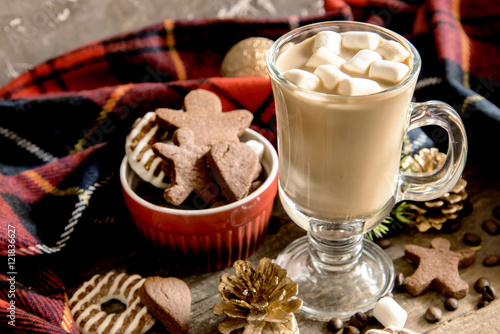 Glass of coffee and marshmallow and gingerbread. 