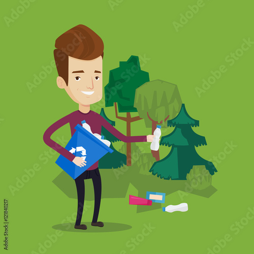 Man collecting garbage in forest.