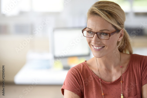 Portrait of attractive businesswoman with eyeglasses