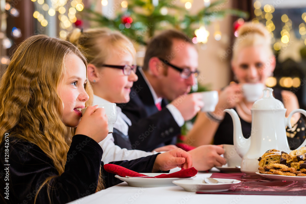 Family having traditional Christmas coffee time