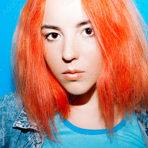 Teenager Girl with Orange hair Stylish hair color