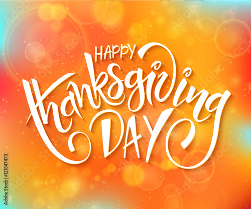 vector thanksgiving day greeting lettering phrase - happy thanksgiving day - on blur autumn background with flares