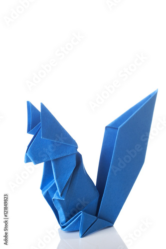 Cute origami art, colored squirrel isolated over a white background