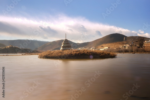 Tibetan stupa in Lamuyangcuo lake located at Songzanlin Tibetan Buddhist Monastery, Shangri-La (Zhongdian), Yunnan, China. © thisisdraft