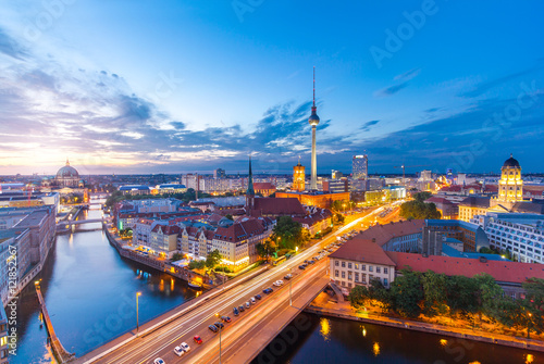 Berlin Panorama am Abend von der Fischerinsel mit Blick auf den Alexanderplatz und Fersehturm photo