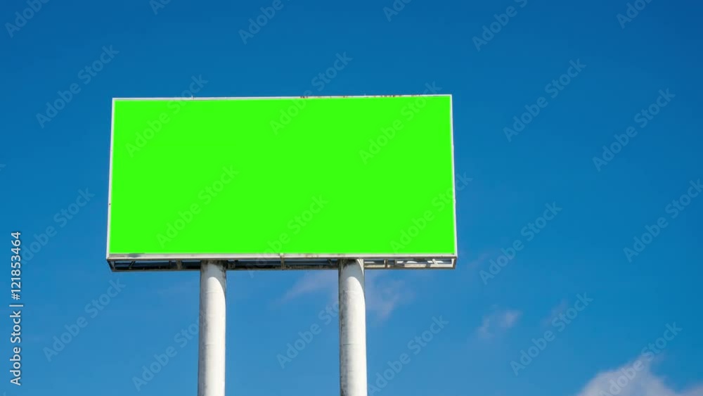 Time lapse of huge sky crapper billboard with blank green chromatic key and blue sky. Time lapse of huge sky crapper billboard with blank green chromatic key and blue sky.