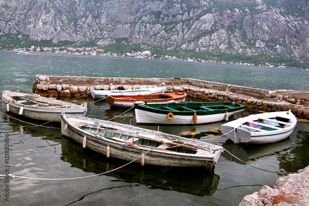 Small fishing boats anchored in the marina