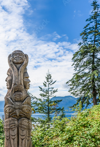 Totem wood pole in British Columbia Canada outdoor © Olesya
