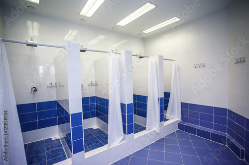 Shower room with cabins in a gym