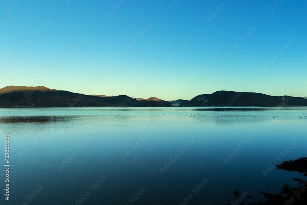 Landscape of Napa Lake located at Shangri-La (Zhongdian), Yunnan, China.  Napa Lake is 3270 meters above sea level and covers 660 square kilometers.