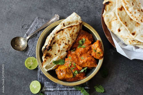 Butter Chicken served with homemade Indian Naan bread