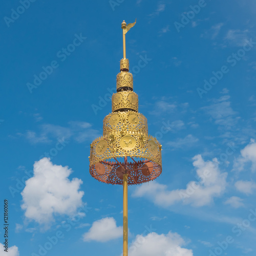 Detail of Golden tiered on decorating the Buddhist temple  in Wat Hin Thaen Lamphachi temple (Temple public) . Kanchanaburi ,Thailand photo