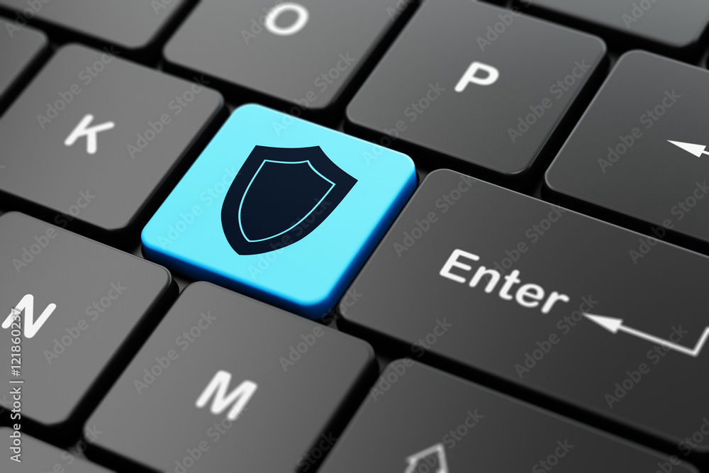 Security concept: Shield on computer keyboard background Security concept: Shield on computer keyboard background