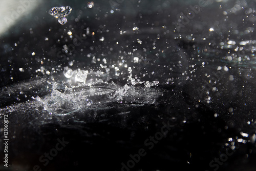 splashes, water splash on black background © byallasaa