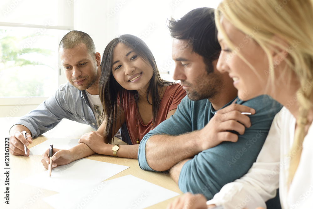 Group of young ethnic business people in meeting Group of young ethnic business people in meeting