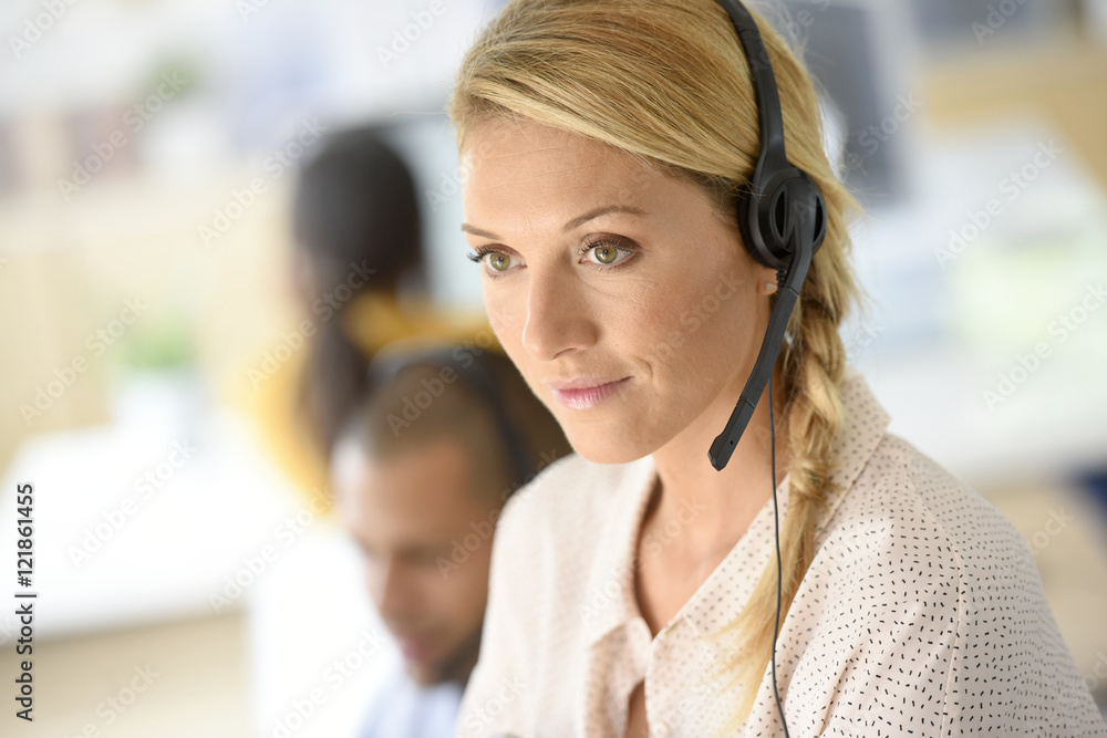 Closeup of customer service manager standing in call center Closeup of customer service manager standing in call center