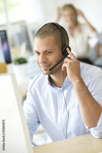 Plakat Customer service operator working in office