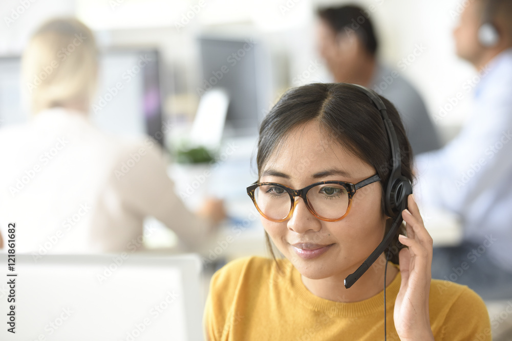 Customer service assistant working in office Customer service assistant working in office