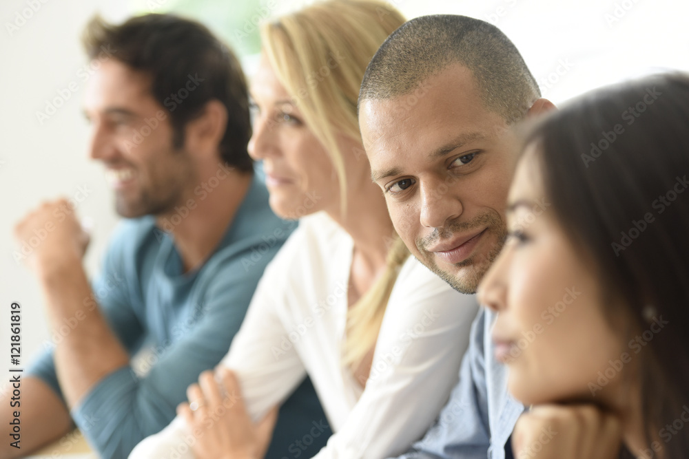 Group of young ethnic business people in meeting Group of young ethnic business people in meeting