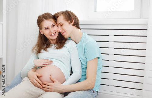 pregnancy. happy family future parents pregnant mother and fathe