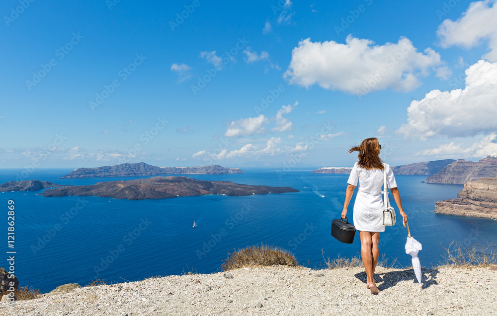 Woman with white umbrella and sea Woman with white umbrella and sea