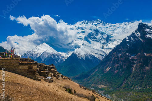 Landskape Photo Tracking Himallaya Vilage Side Hill.View Snow Nepal Mountans Background. Hikking Sport Travel. Horizontal.