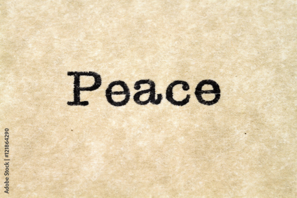 A close up image of the word peace from a typewriter