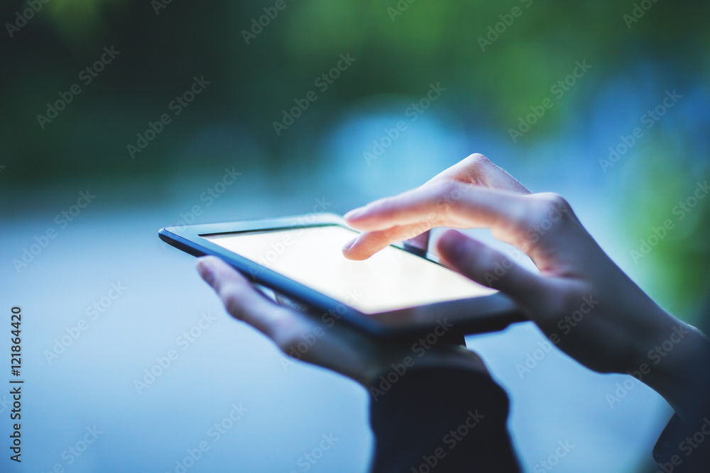 Female hands using tablet Stock Photo | Adobe Stock