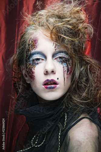 Woman with creative make up. Halloween theme. 
