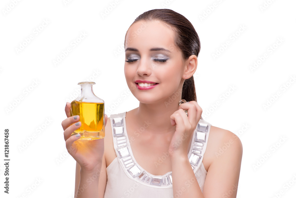 Woman with bottle of perfume isolated on white Woman with bottle of perfume isolated on white