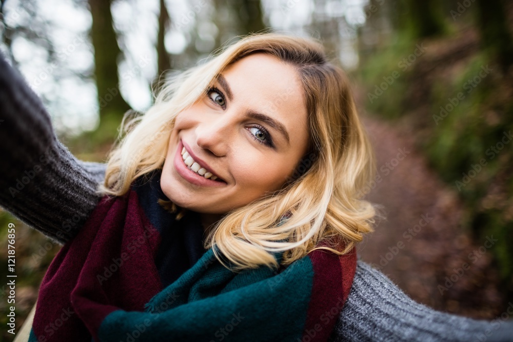 Close-up of smiling woman in forest Close-up of smiling woman in forest